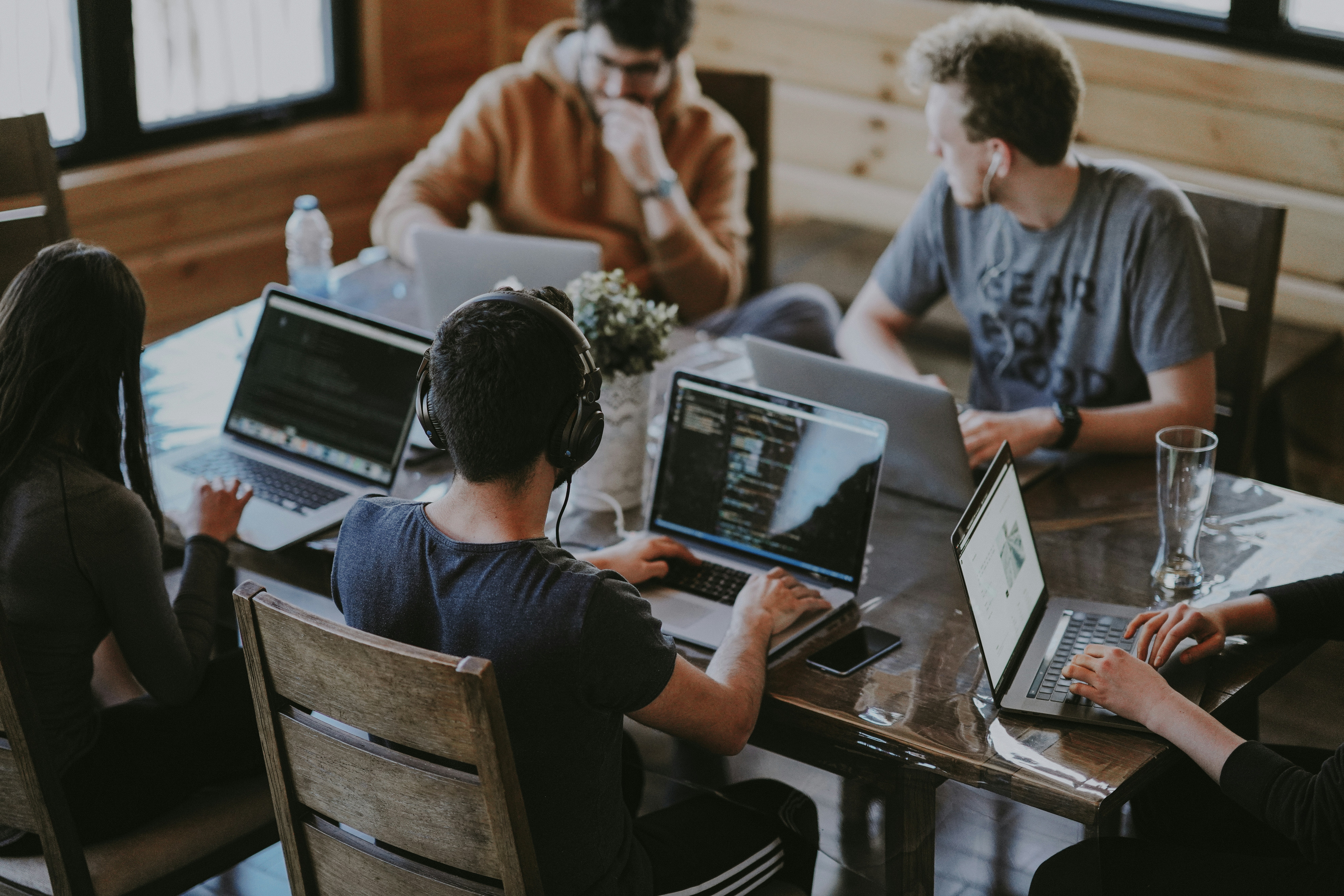 Bookkeeping team collaborating at a desk